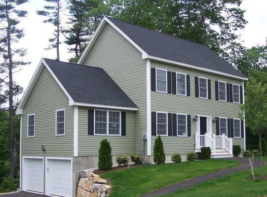 New gray asphalt shingle roof installation on a colonial home on Long Island