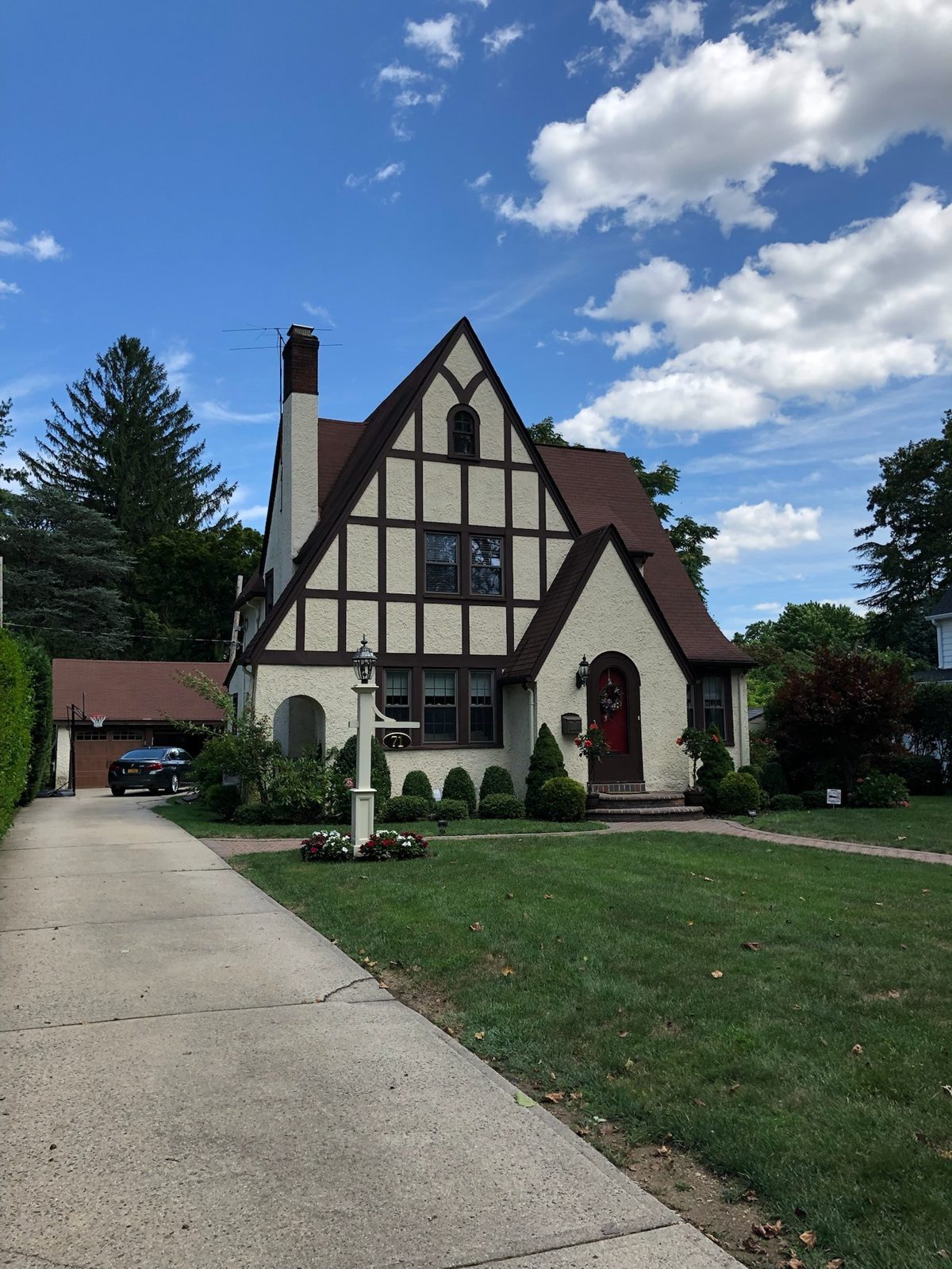 Brown shingle roof replacement on a Tudor style home in Nassau County, Long Island